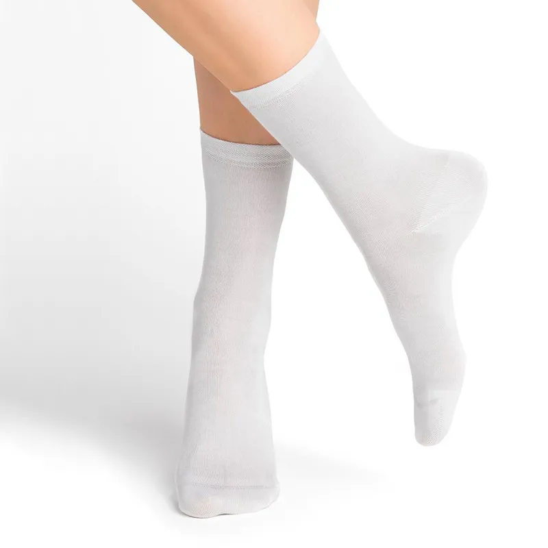 Chaussettes unies en soie pour femme